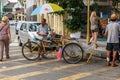 Rickshaw driver waiting for customer on Georgetown Street