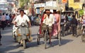 Rickshaw driver working on the street of Indian city