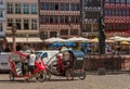 Rickshaw drivers with their vehicles on the Roemerberg waiting for passengers for a city tour, Frankfurt, Germany