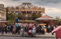 Rickshaw parked in front of the carousel of the Eiffel Tower