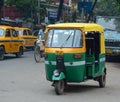 Rickshaw three-weeler tuk-tuk on the street in Kolkata