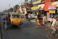 Rickshaws and cyclist on the street