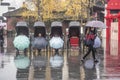 The rickshaws waiting for guests on the Confucius Temple market in the early winter and rainy days