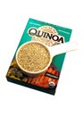 Box of Ancient Harvest QUINOA on white background with measuring spoon