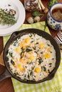 Ricotta baked with spinach and quail eggs