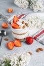 Ricotta dessert with fresh strawberries. Healthy breakfast of yogurt, strawberry and almonds Royalty Free Stock Photo