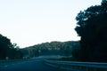 Ride on a foggy road in an early summer morning Royalty Free Stock Photo