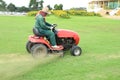 Ride-on lawn mower cutting grass Royalty Free Stock Photo