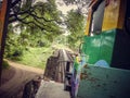 Ride a local old train over a small bridge in Thailand Royalty Free Stock Photo
