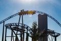 Ride roller coaster in blurred motion on sky background in amusement park Royalty Free Stock Photo