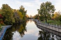 Rideau Canal, Hog\'s Back locks in Ottawa. Fall season in park with river Royalty Free Stock Photo