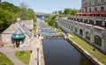 Rideau canal locks alongside the Fairmont Chateau Laurier luxury hotel in downtown Ottawa, Ontario, Canada Royalty Free Stock Photo