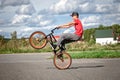 A rider on a bicycle does tricks Royalty Free Stock Photo