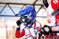 Rider checks the safety glasses before the start of the bike race Royalty Free Stock Photo