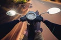 Rider driving scooter on an asphalt road. Motion blurred backgro Royalty Free Stock Photo