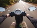 Rider driving scooter on an asphalt road. Motion blurred backgro Royalty Free Stock Photo