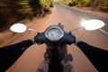 Rider driving scooter on an asphalt road. Motion blurred backgro Royalty Free Stock Photo