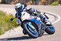 Rider in the foreground on his motorcycle in full competition