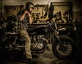 Rider and his vintage style cafe-racer motorcycle