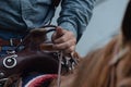 Rider holds onto reins of his horse Royalty Free Stock Photo