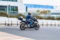 Rider on the Honda VFR1200F motorbike riding on street. Motorcycle running on the asphalt road in city