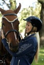 Rider and horse hugging Royalty Free Stock Photo