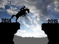 The rider on the horse jumping into the New Year 2015 Royalty Free Stock Photo