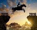 The rider on the horse jumping into the New Year 2016 Royalty Free Stock Photo