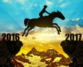 The rider on the horse jumping into the New Year 2017 Royalty Free Stock Photo