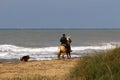 Rider on horseback riding on the Mediterranean coast Royalty Free Stock Photo