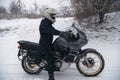 Rider man on adventure motorcycle. Winter fun. snowy day. the snow fall. off road dual sport crazy extreme ride, active life style