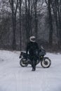 Rider man on adventure motorcycle. Winter fun. snowy day. the snow fall. off road dual sport crazy extreme ride, active life style