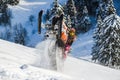 Rider on the snowmobile in the mountains ski resort in Sakhalin island