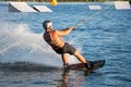 Rider wakeboarding in the cable wake park Merkur