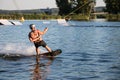 Rider wakeboarding in the cable wake park Merkur