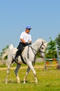 Rider on white arabian horse Royalty Free Stock Photo