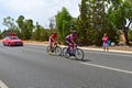 Manzana Postobon And Cofidis Riders Ahead Of Team Car Royalty Free Stock Photo