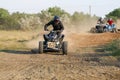 Riders on quad bikes