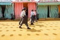 Riders walk through the April Fair Seville dressed in tradional traje corto Royalty Free Stock Photo