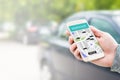 Rideshare taxi app on smartphone screen. Royalty Free Stock Photo