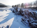The ridge of sharp rocks in the frozen Katun River, Altai Mountains