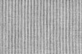 Ridge texture background of velour corduroy gray cloth. Large ribbed, coarse weaving fabric Royalty Free Stock Photo