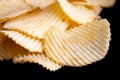 Ridged fried potato crisps Royalty Free Stock Photo