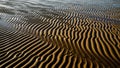 And ridges are formed by the natural ebb and flow of water showcasing Royalty Free Stock Photo