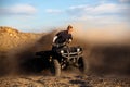 Riding ATV - teen on quad Royalty Free Stock Photo