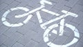 Riding bicycle, crossing cycle path sign, bike friendly city, urban scene Royalty Free Stock Photo