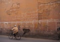 Riding a bicycle in the streets of Marrakesh, Morocco Royalty Free Stock Photo