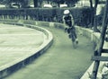 Riding a bike on bicycle lane , blurred motion Royalty Free Stock Photo