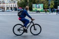 Riding a bike. Commuters on bike in Bucharest, Romania, 2021