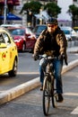 Riding a bike. Commuters on bike in Bucharest, Romania, 2021